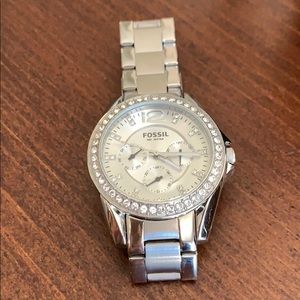 Women’s silver Fossil watch
